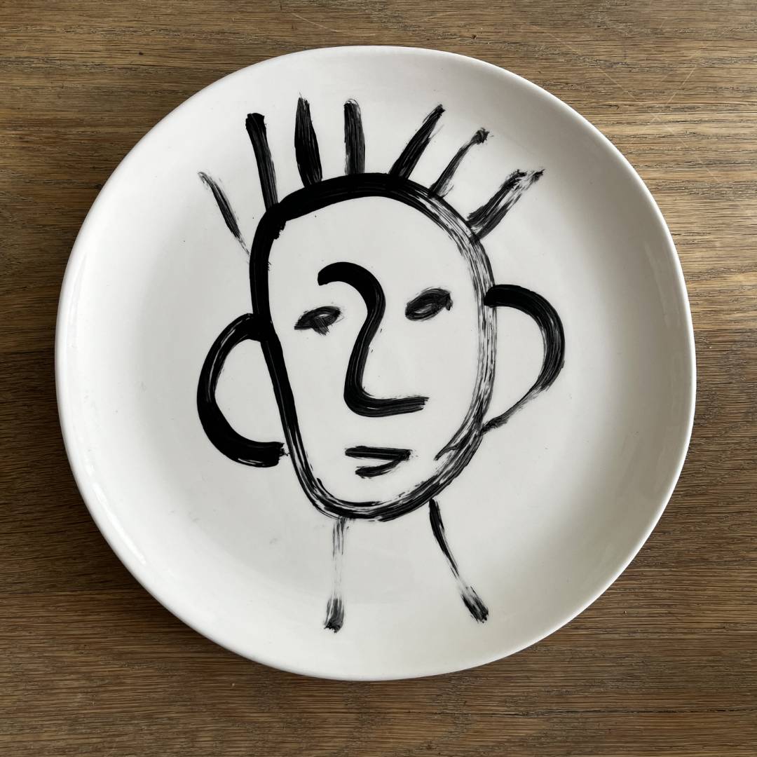 The Detailsmith Handpainted Ceramic Plate Portrait Collection Medium plate in black